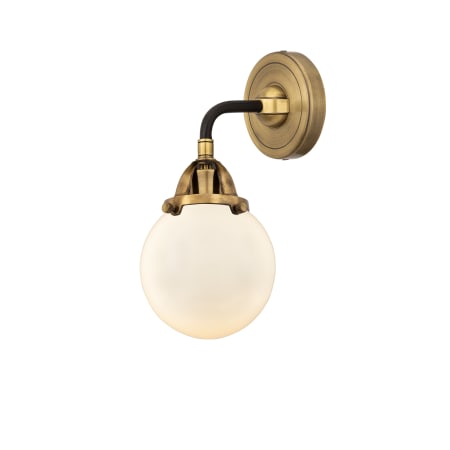 A large image of the Innovations Lighting 288-1W-11-6 Beacon Sconce Black Antique Brass / Matte White