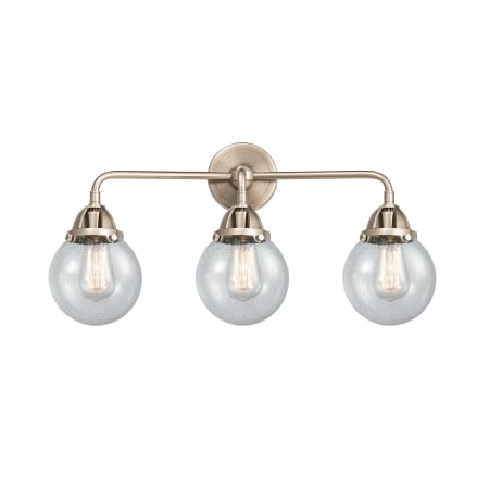 A large image of the Innovations Lighting 288-3W-10-24 Beacon Vanity Brushed Satin Nickel / Seedy