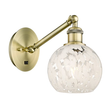 A large image of the Innovations Lighting 317-1W-8-6 White Mouchette Sconce Antique Brass