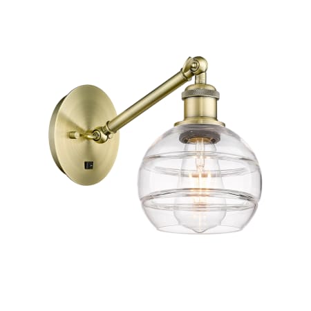 A large image of the Innovations Lighting 317-1W-8-6 Rochester Sconce Antique Brass / Clear