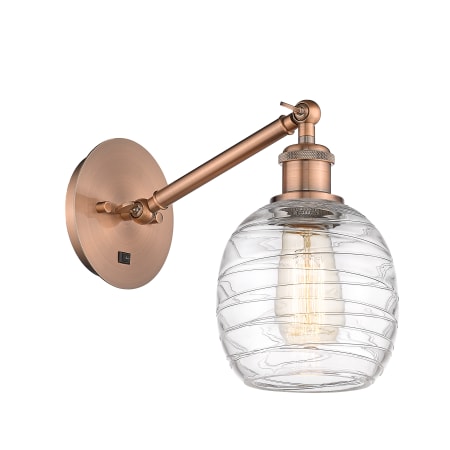 A large image of the Innovations Lighting 317-1W-13-6 Belfast Sconce Antique Copper / Deco Swirl
