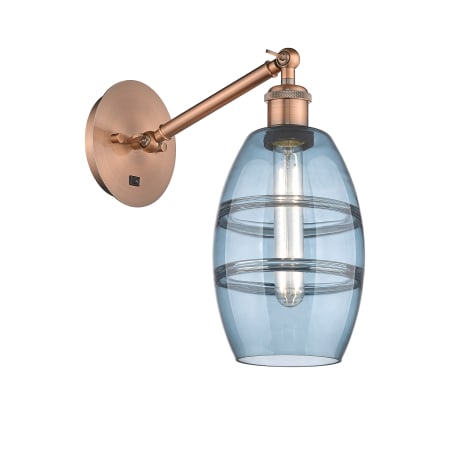 A large image of the Innovations Lighting 317-1W-8-6 Vaz Sconce Antique Copper / Blue