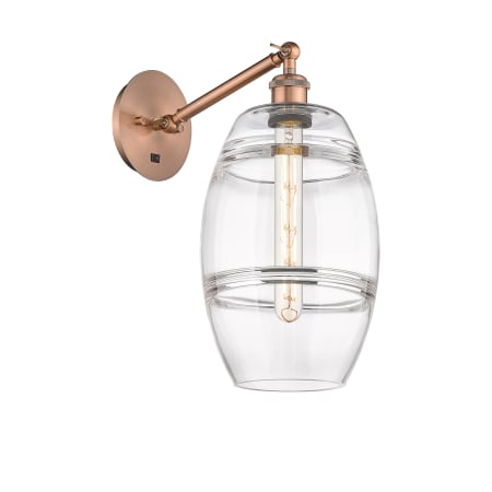 A large image of the Innovations Lighting 317-1W-10-8 Vaz Sconce Antique Copper / Clear