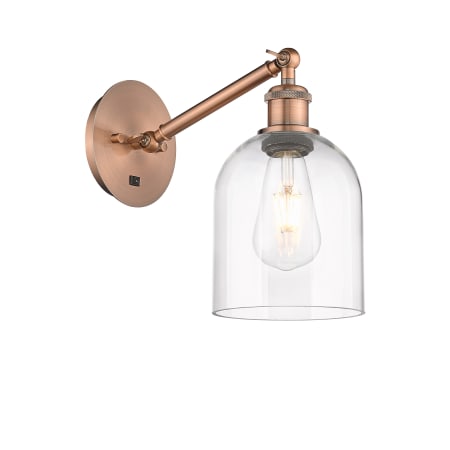 A large image of the Innovations Lighting 317-1W-10-6 Bella Sconce Antique Copper / Clear