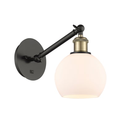 A large image of the Innovations Lighting 317-1W-12-6 Athens Sconce Black Antique Brass / Matte White