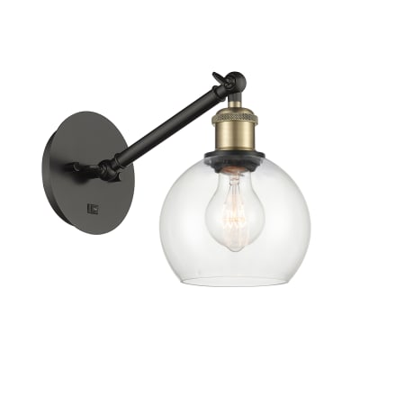 A large image of the Innovations Lighting 317-1W-12-6 Athens Sconce Black Antique Brass / Clear