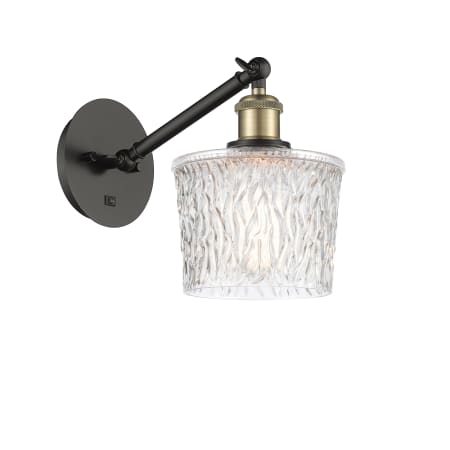 A large image of the Innovations Lighting 317-1W-12-7 Niagra Sconce Black Antique Brass / Clear