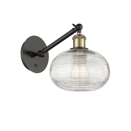 A large image of the Innovations Lighting 317-1W-9-8 Ithaca Sconce Black Antique Brass / Clear Ithaca