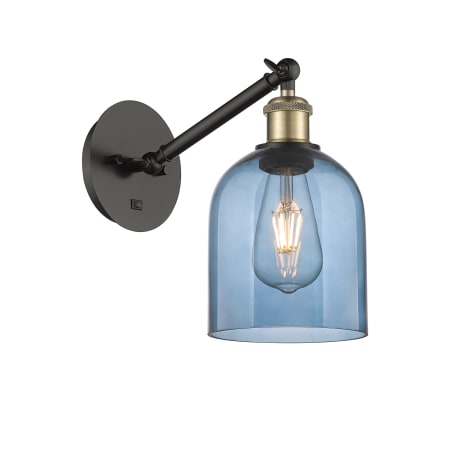 A large image of the Innovations Lighting 317-1W-10-6 Bella Sconce Black Antique Brass / Princess Blue