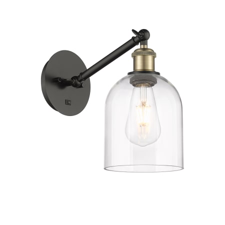 A large image of the Innovations Lighting 317-1W-10-6 Bella Sconce Black Antique Brass / Clear