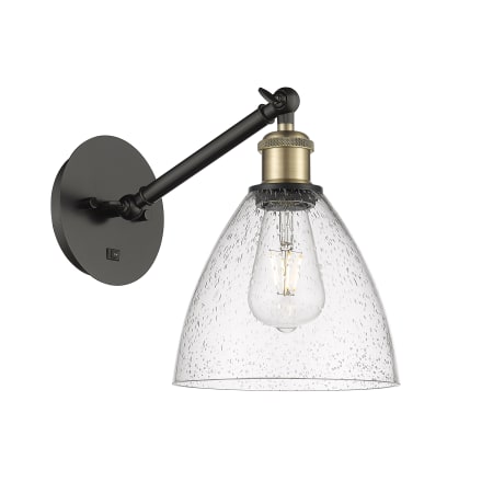 A large image of the Innovations Lighting 317-1W-14-8 Bristol Sconce Black Antique Brass / Seedy