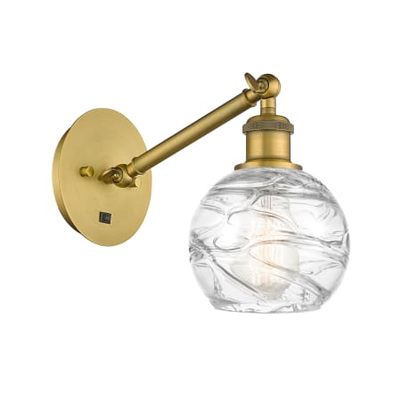 A large image of the Innovations Lighting 317-1W-12-6 Athens Sconce Brushed Brass / Clear Deco Swirl