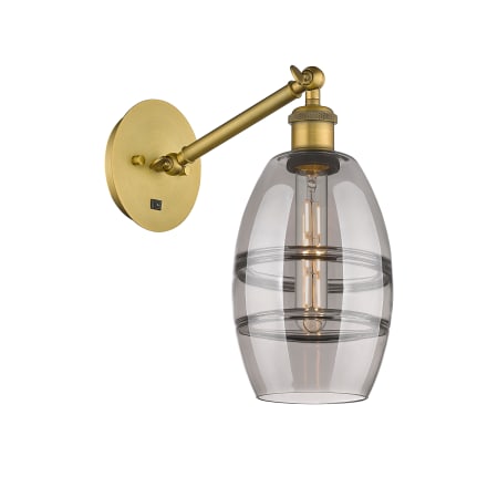 A large image of the Innovations Lighting 317-1W-8-6 Vaz Sconce Brushed Brass / Smoked
