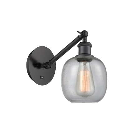 A large image of the Innovations Lighting 317-1W-13-6 Belfast Sconce Matte Black / Seedy