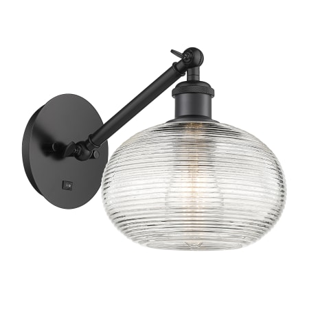 A large image of the Innovations Lighting 317-1W-9-8 Ithaca Sconce Matte Black / Clear Ithaca