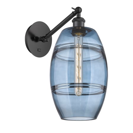 A large image of the Innovations Lighting 317-1W-10-8 Vaz Sconce Matte Black / Blue