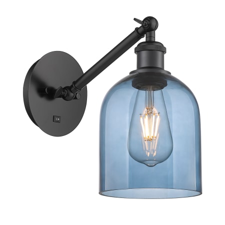 A large image of the Innovations Lighting 317-1W-10-6 Bella Sconce Matte Black / Princess Blue