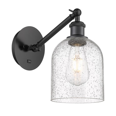 A large image of the Innovations Lighting 317-1W-10-6 Bella Sconce Matte Black / Seedy