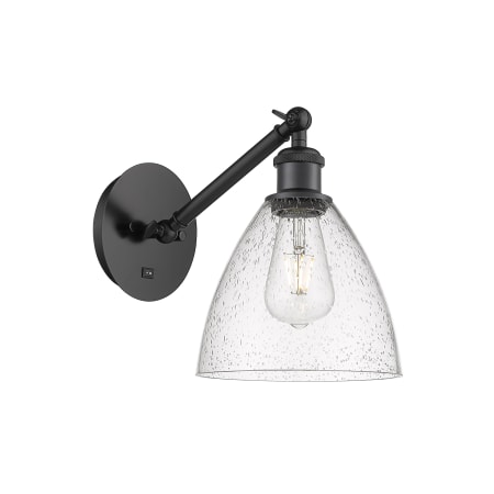 A large image of the Innovations Lighting 317-1W-13-8 Bristol Sconce Matte Black / Seedy