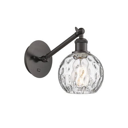 A large image of the Innovations Lighting 317-1W-12-6 Athens Sconce Oil Rubbed Bronze / Clear Water Glass