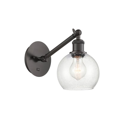 A large image of the Innovations Lighting 317-1W-12-6 Athens Sconce Oil Rubbed Bronze / Seedy