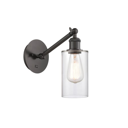 A large image of the Innovations Lighting 317-1W-13-5 Clymer Sconce Oil Rubbed Bronze / Clear