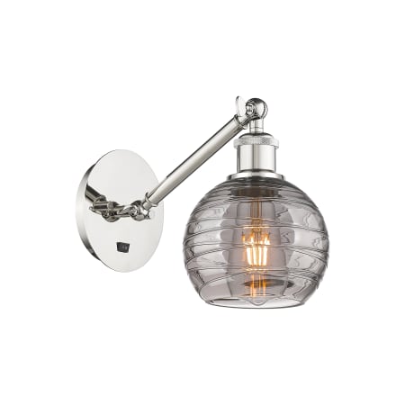 A large image of the Innovations Lighting 317-1W 8 6 Athens Deco Swirl Sconce Polished Nickel / Light Smoke Deco Swirl