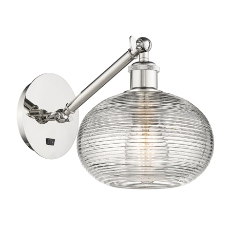 A large image of the Innovations Lighting 317-1W-9-8 Ithaca Sconce Polished Nickel / Clear Ithaca