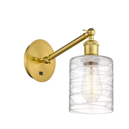 A large image of the Innovations Lighting 317-1W-13-6 Cobbleskill Sconce Satin Gold / Deco Swirl