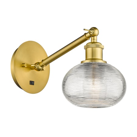 A large image of the Innovations Lighting 317-1W-7-6 Ithaca Sconce Satin Gold / Clear Ithaca