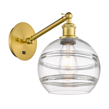 A large image of the Innovations Lighting 317-1W-10-8 Rochester Sconce Satin Gold / Clear