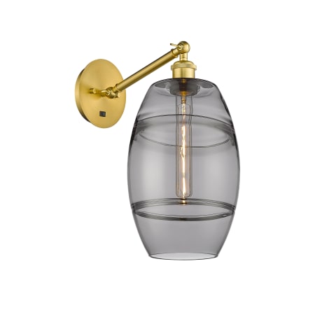 A large image of the Innovations Lighting 317-1W-10-8 Vaz Sconce Satin Gold / Smoked