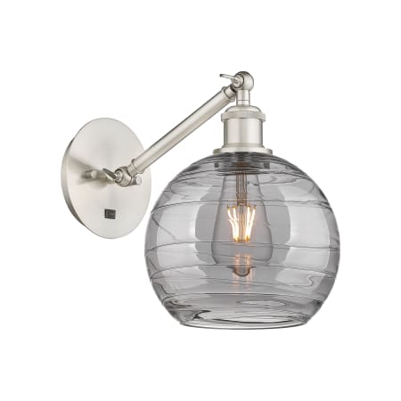 A large image of the Innovations Lighting 317-1W 10 8 Athens Deco Swirl Sconce Brushed Satin Nickel / Light Smoke Deco Swirl