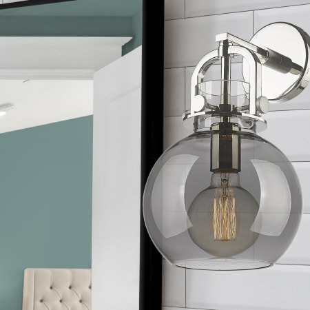 A large image of the Innovations Lighting 410-1W-14-8 Newton Sphere Sconce Alternate Image