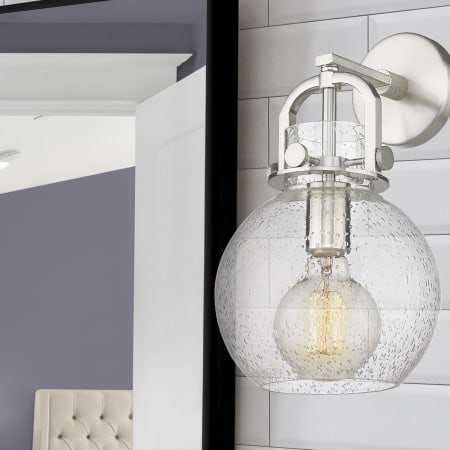 A large image of the Innovations Lighting 410-1W-14-8 Newton Sphere Sconce Alternate Image
