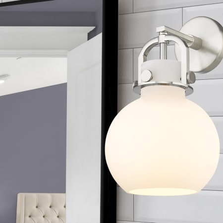 A large image of the Innovations Lighting 410-1W-5-8 Newton Sphere Sconce Alternate Image