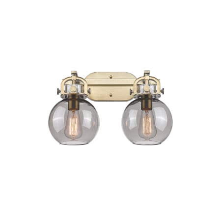 A large image of the Innovations Lighting 410-2W-12-17 Newton Sphere Vanity Brushed Brass / Plated Smoke