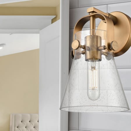 A large image of the Innovations Lighting 423-1W-10-7 Pilaster II Cone Sconce Alternate Image