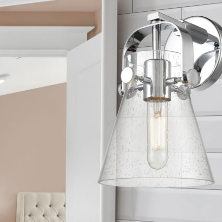 A large image of the Innovations Lighting 423-1W-10-7 Pilaster II Cone Sconce Alternate Image