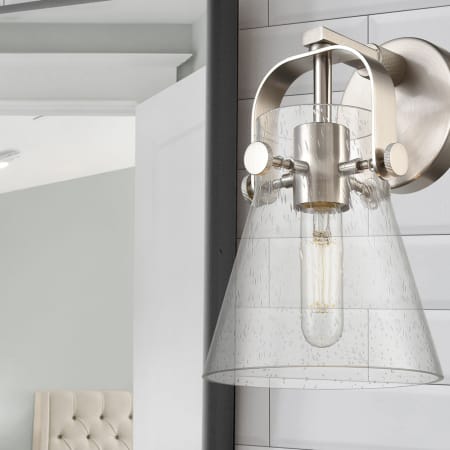 A large image of the Innovations Lighting 423-1W-10-7 Pilaster II Cone Sconce Alternate Image