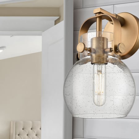 A large image of the Innovations Lighting 423-1W-10-7 Pilaster II Sphere Sconce Alternate Image