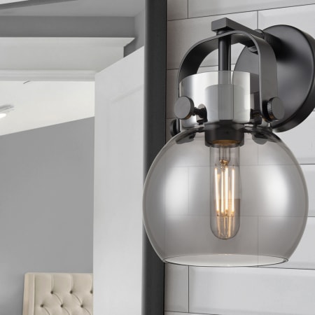 A large image of the Innovations Lighting 423-1W-10-7 Pilaster II Sphere Sconce Alternate Image