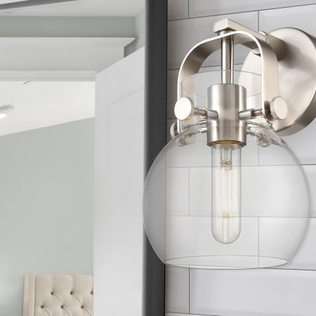 A large image of the Innovations Lighting 423-1W-10-7 Pilaster II Sphere Sconce Alternate Image