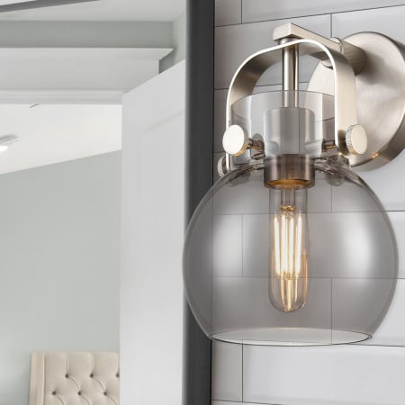 A large image of the Innovations Lighting 423-1W-10-7 Pilaster II Sphere Sconce Alternate Image