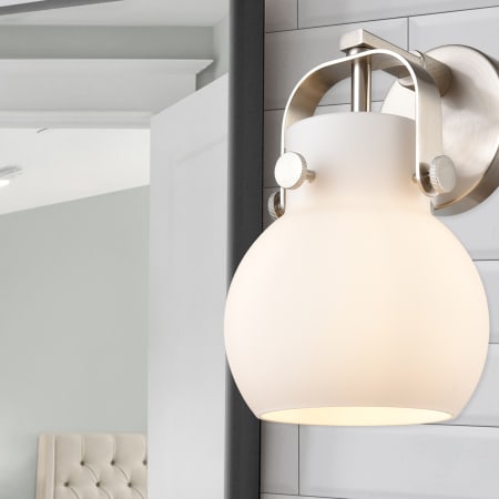 A large image of the Innovations Lighting 423-1W-10-7 Pilaster II Sphere Sconce Alternate Image