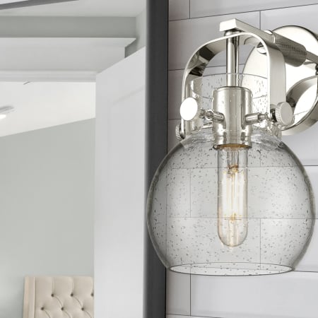 A large image of the Innovations Lighting 423-1W-5-7 Pilaster II Sphere Sconce Alternate Image