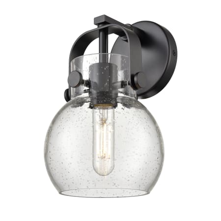 A large image of the Innovations Lighting 423-1W-10-7 Pilaster II Sphere Sconce Matte Black / Seedy