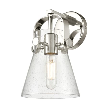 A large image of the Innovations Lighting 423-1W-5-7 Pilaster II Cone Sconce Polished Nickel / Seedy