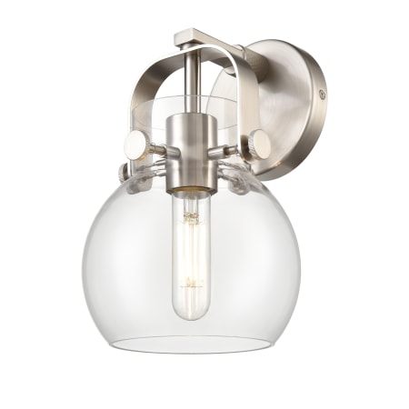 A large image of the Innovations Lighting 423-1W-10-7 Pilaster II Sphere Sconce Satin Nickel / Clear