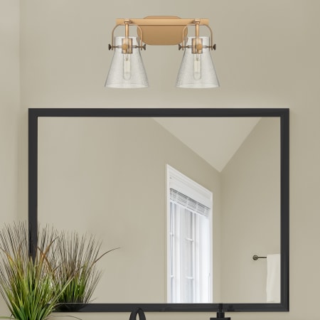 A large image of the Innovations Lighting 423-2W-10-17 Pilaster II Cone Vanity Alternate Image